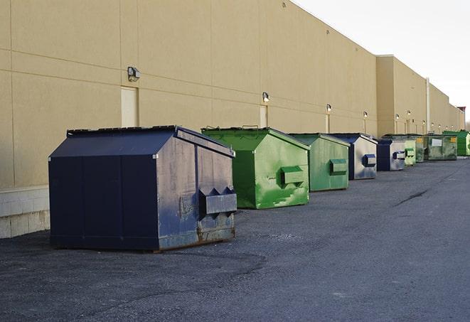 roll-off dumpsters parked at a job site in Cleveland Heights